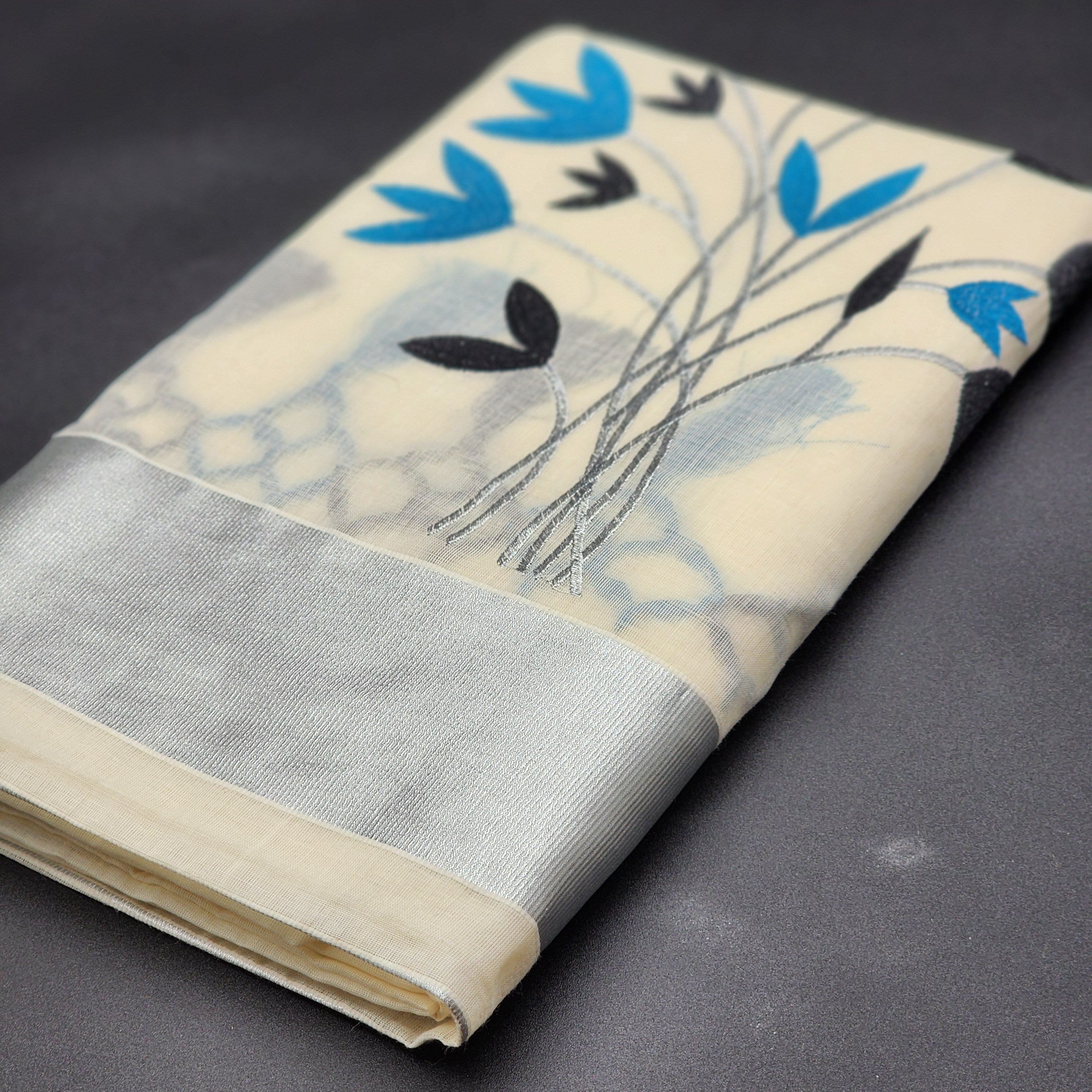 Tissue Silk Saree featuring Silver, Blue and Black floral design with Silver border 2106