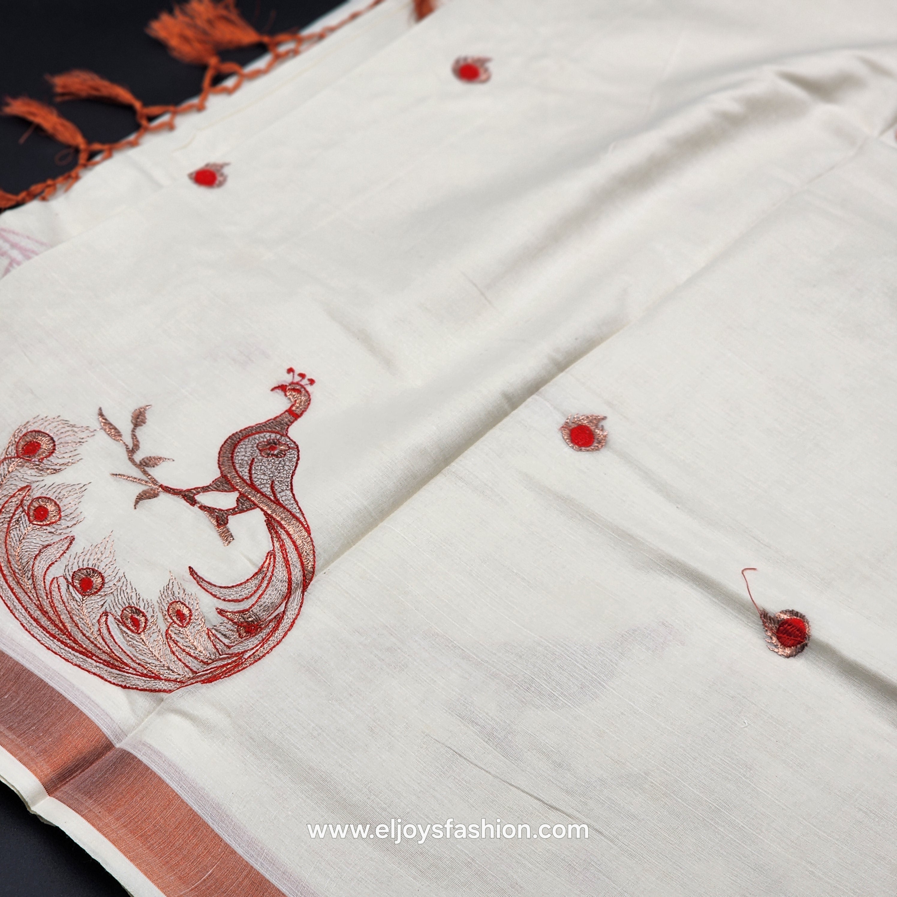 Saree 4 inch wide copper border with Tassel works ,The body is an embroidered red peacock on a golden branch 2147