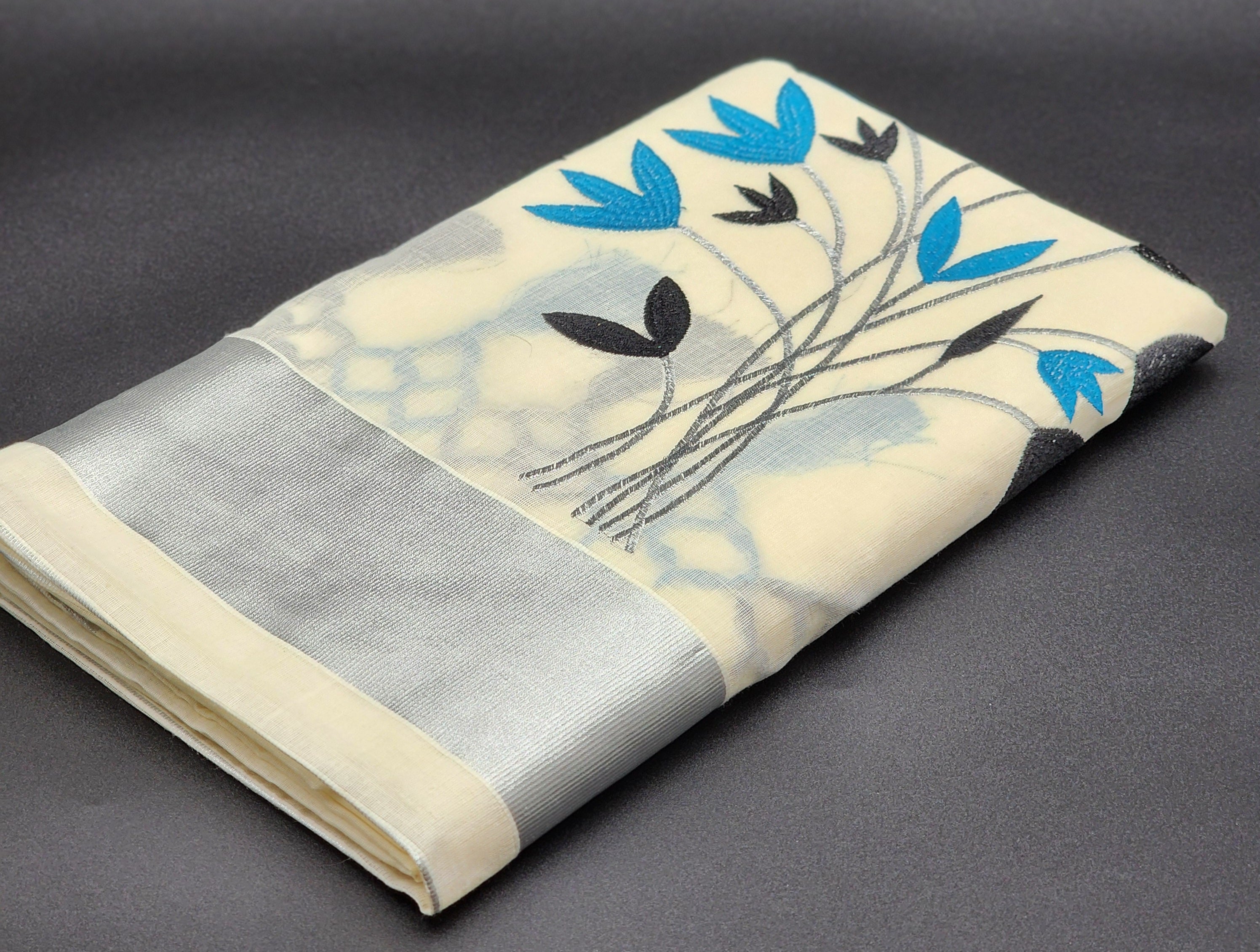 Tissue Silk Saree featuring Silver, Blue and Black floral design with Silver border 2106